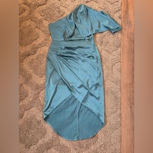 Teal one shoulder high low dress. The green dress is just for fit reference